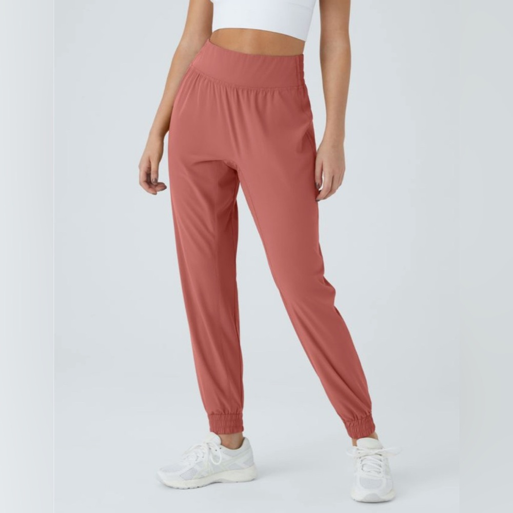 NWOT Halara High Waisted Elastic Waistband Joggers in Grapefruit Orange-size XS